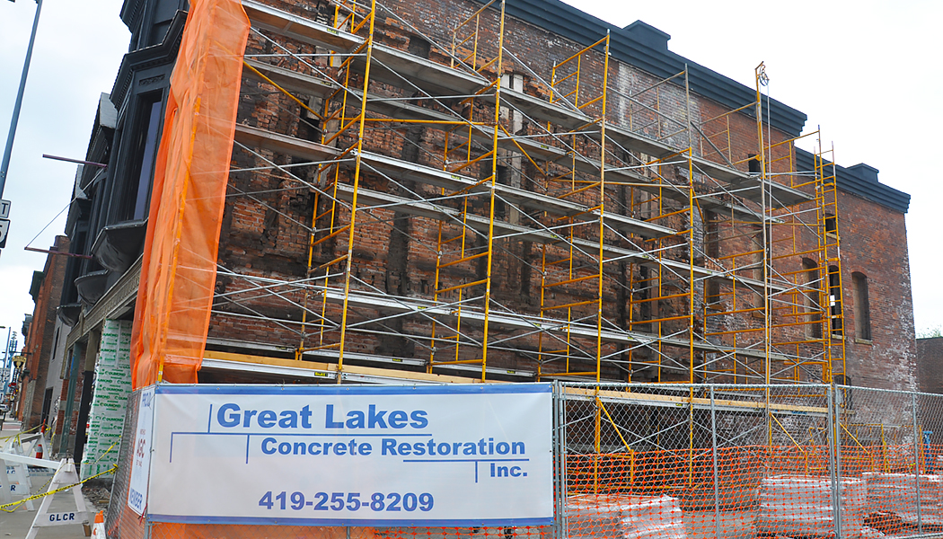 Great Lakes Concrete Monroe Downtown Toledo Building scaffolding brick wall repair