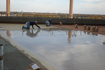 GLCR Edison Deck Restoration appying liquid roofing toledo downtown